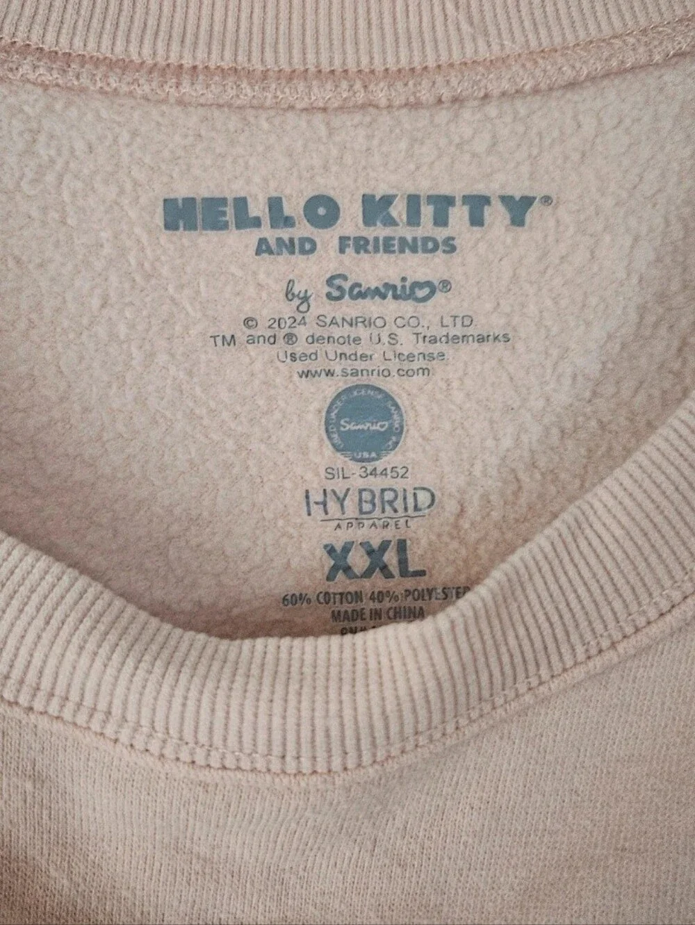 Hello Kitty Peach/Pink Crewneck Sweatshirt with Purple Graphic - Picture 2 of 2
